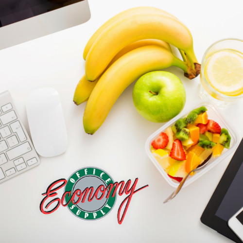 Economy Office Supply with fruit on desk