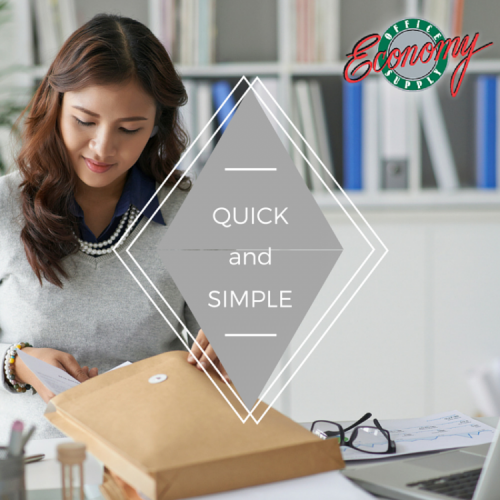 Young woman organizing office papers
